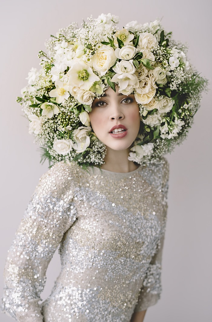 Model wearing a white sequined gown and a Flower Fro designed by Susan McLeary and photographed by Amanda Dumouchelle