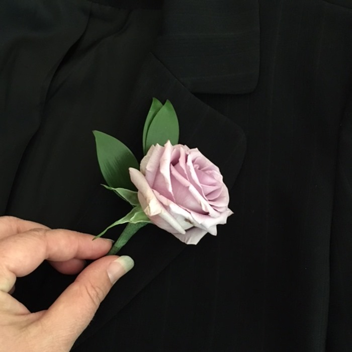 A properly secured pink rose boutonniere on the Botanical Brouhaha Expert Panel 102