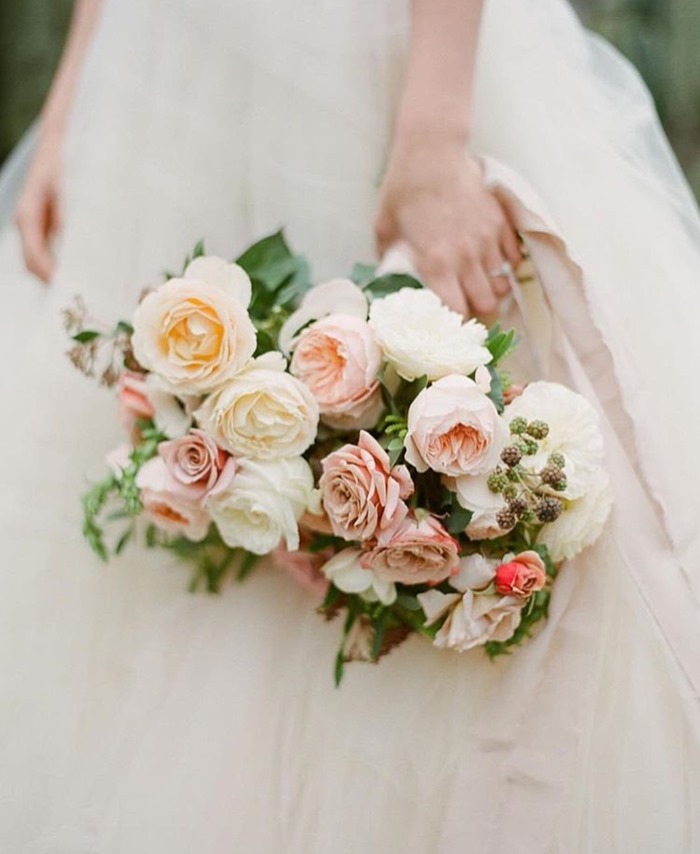 Bridal bouquet of white and mauve roses from Nancy Teasley and Ella Rose Farm